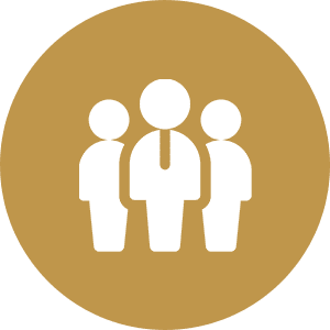 Three white figures on brown circle.